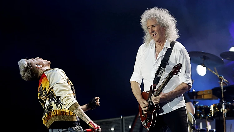 אדם למברט ולהקת קויין