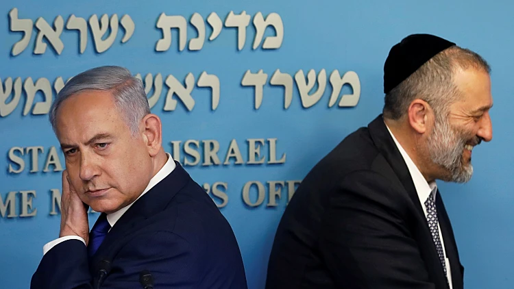 ראש הממשלה נתניהו ושר הפנים אריה דרעי במסיבת העיתונאים על הסכם הפליטים (רויטרס )