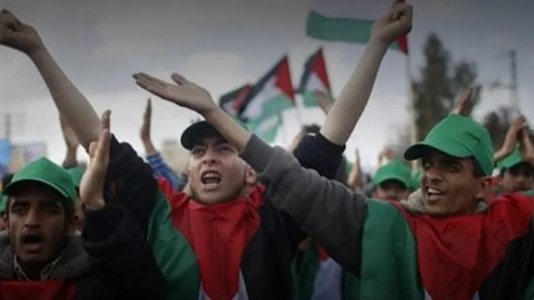 פלסטינים בהפגנות יום האדמה בצפון רצועת עזה , רויטרס