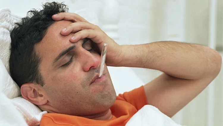 עם מד חום בפה