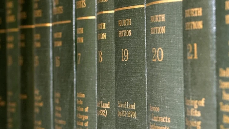 אילוסטרציה אנציקלופדיה באנגלית - כרכי האנציקלופדיה מסודרים על מדף