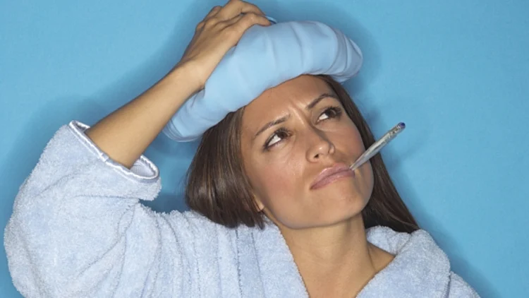 עם מד חום בפה