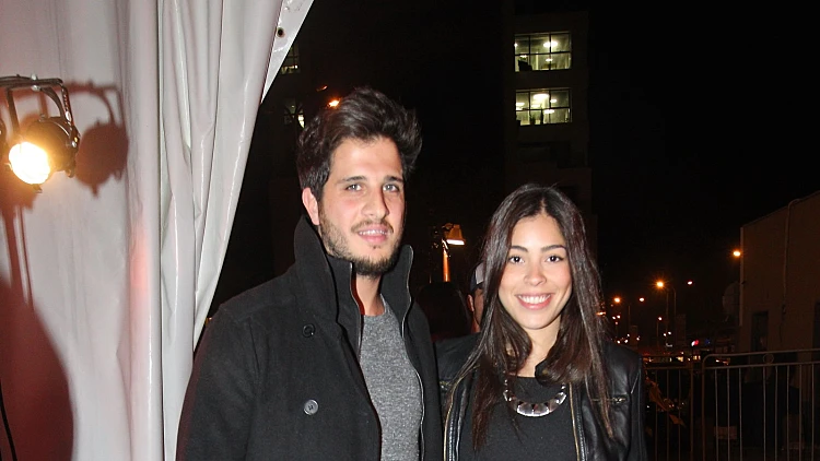 עדי אטון ובת זוגו. שנשים עוד חור בחגורה?