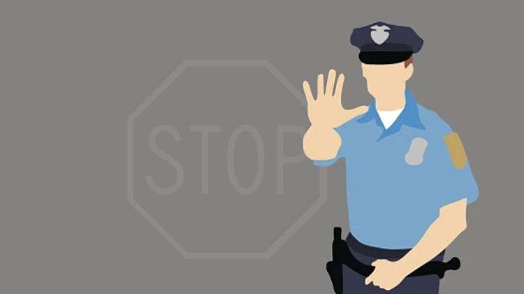 אילוסטרציה של שוטר מסמן לעצור