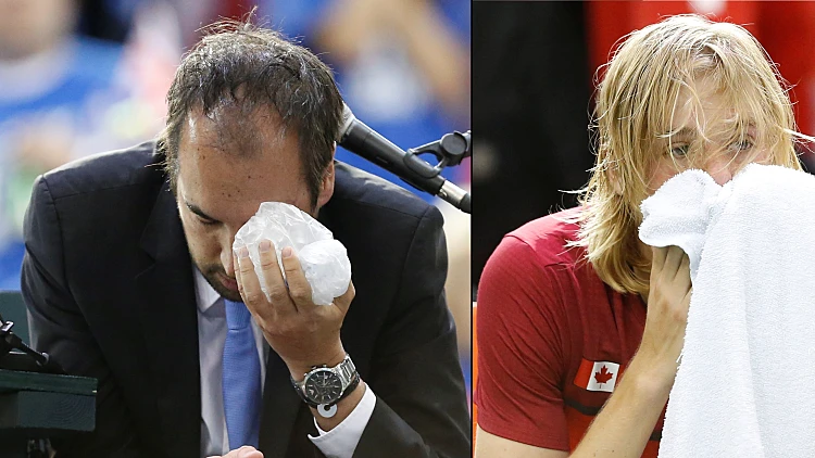 דניס שפובלוב הטניסאי הקנדי והשופט ארנו גבאס שנפצע בעין כתוצאה מחבטה שלו