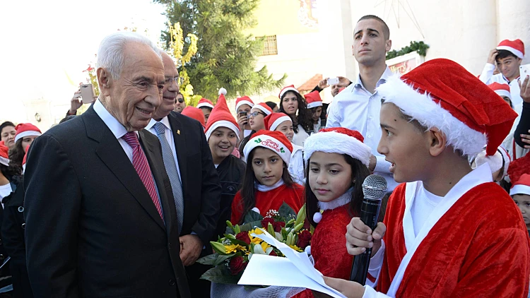 נשיא המדינה שמעון פרס בביקור לרגל חג המולד בכנסייה של הקהילה הקתולית-פרנסיסקנית ברמלה