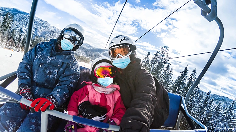 Family,wearing,a,medical,mask,during,covid 19,coronavirus,on,a