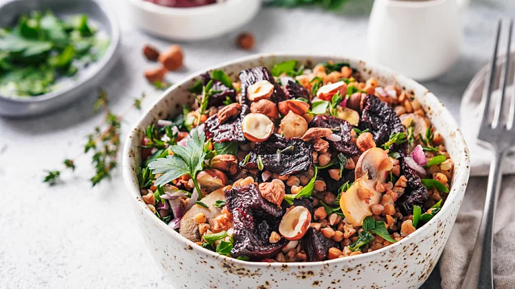 Warm,buckwheat,and,beetroot,salad,on,gray,background.,vegetarian,diet