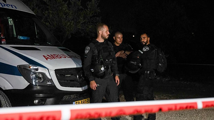 שוטרים בזירת הטבח באבו סנאן, בחודש שעבר