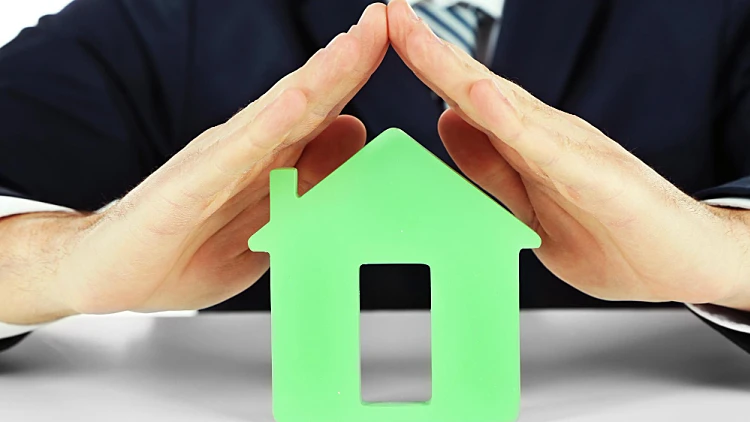 Male Hands With Model House Cl