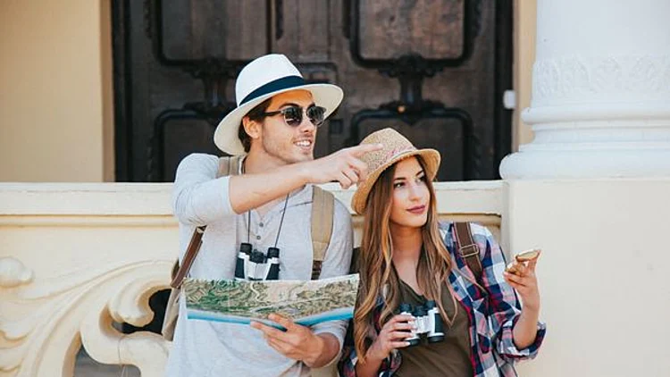 Couple Travelers Pointing Dire