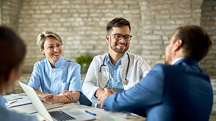 Group Healthcare Workers Greet