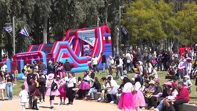 פורים בצל המלחמה: התחפושות, החגיגות והעדלאידע שמבחלוקת