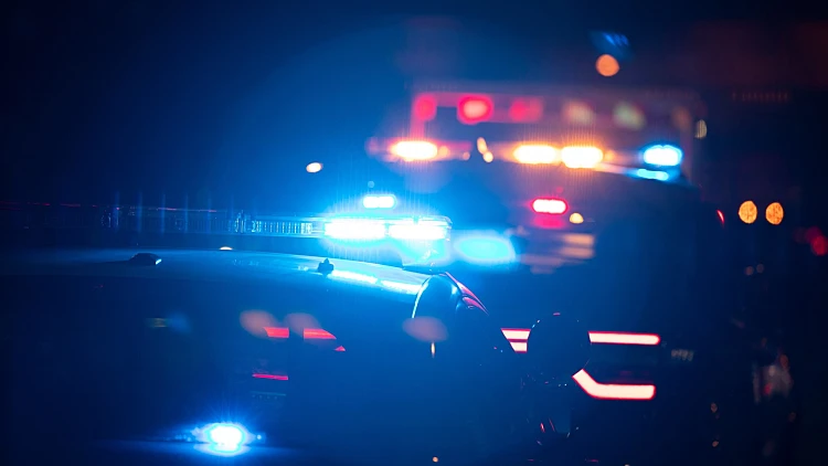 Police,units,respond,to,the,scene,of,an,emergency.