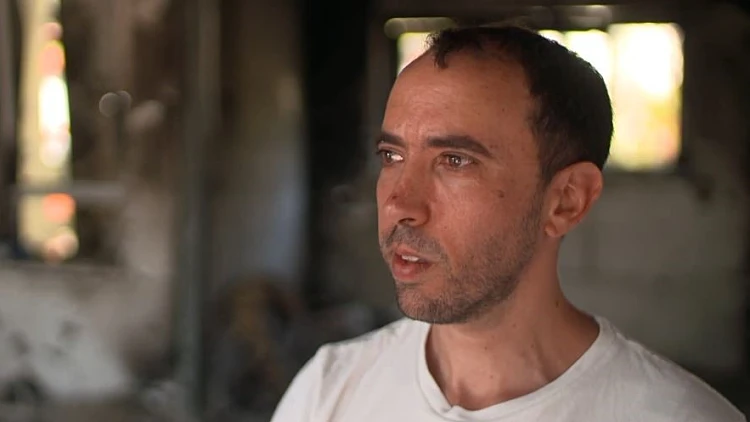 "השקט והיופי הפכו לבית קברות": שורד השבי טל שהם חוזר לבארי