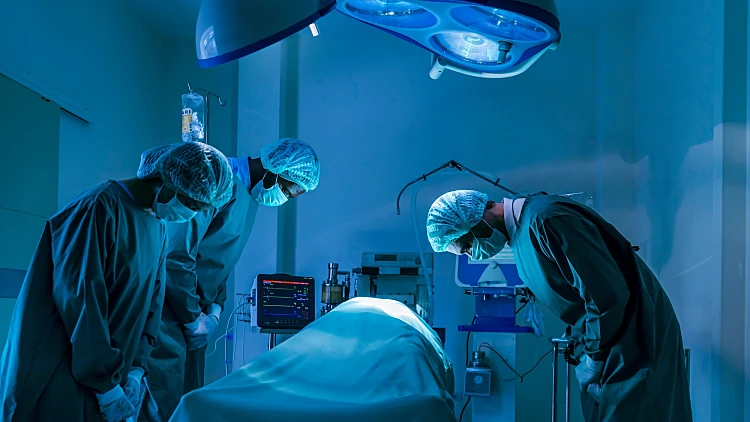 Team,of,surgeon,doctors,are,paying,respect,and,tribute,to