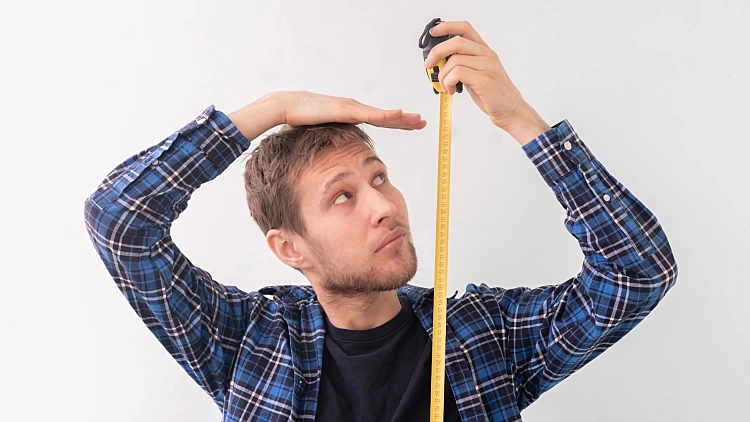 Simple,adult,teenager,male,person,with,a,roll,tape,measure