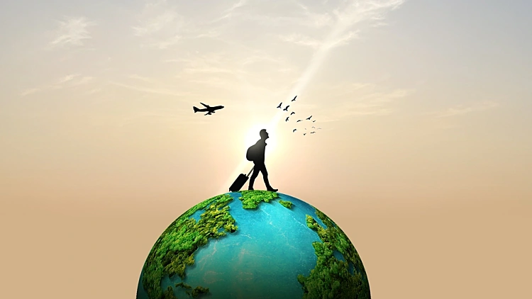 "יום התיירות הבינלאומי" - מטייל עם טרולי על הגלובוס. תיירות, טיולים, חופשה, מטוס, לטייל בעולם