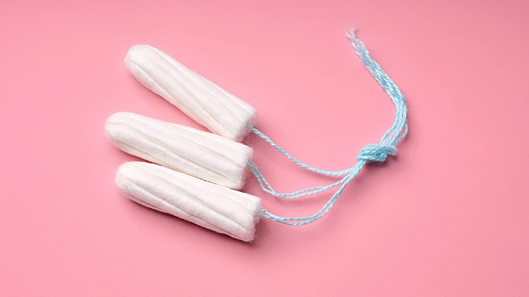 Medical,female,tampon,on,a,pink,background.,hygienic,white,tampon