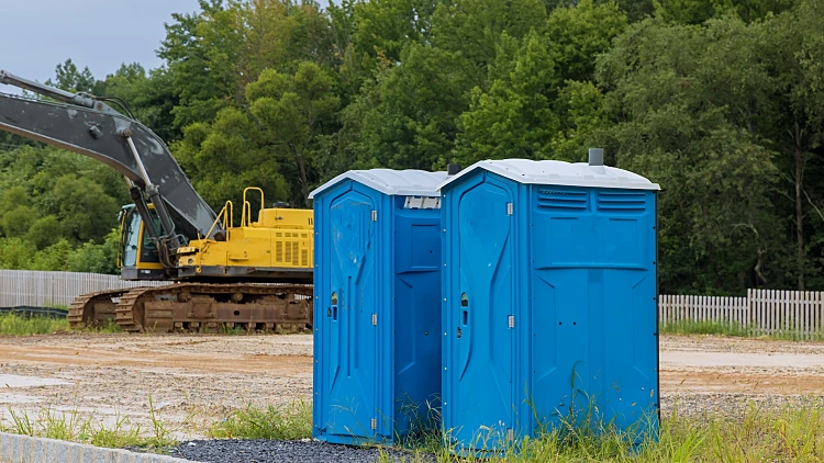Portable,restroom,on,house,under,construction,in,construction,site,for