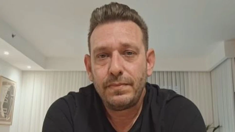 נהג המונית שנשלח לאסוף מעטפת כסף - והציל קשישה מניסיון הונאה