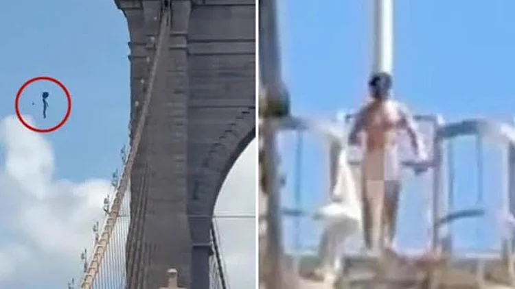 גבר טיפס בעירום לפסגת גשר ענק, נעץ בה דגלים - וקפץ למטה
