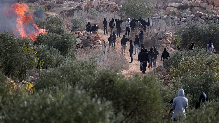 צלמת הוושינגטון פוסט הותקפה בידי מתנחלים: "בעטו בי במשך 10 דק'"