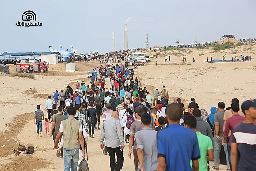 פלסטינים מגיעים להפגנות ברצועת עזה