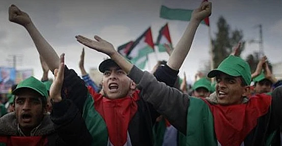 פלסטינים בהפגנות יום האדמה בצפון רצועת עזה , רויטרס