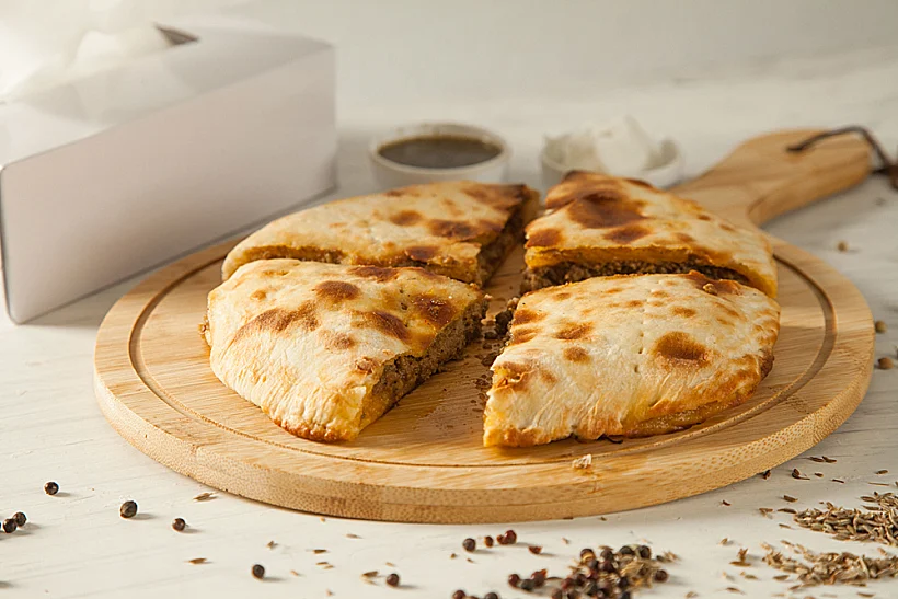 Stuffed,qeema,minced,meat,naan,with,herbs,and,spices,and