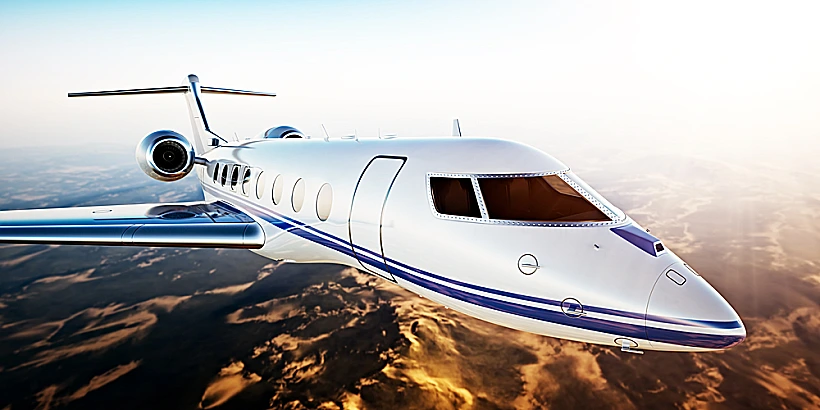 Realistic,photo,of,white,luxury,generic,design,private,jet,flying