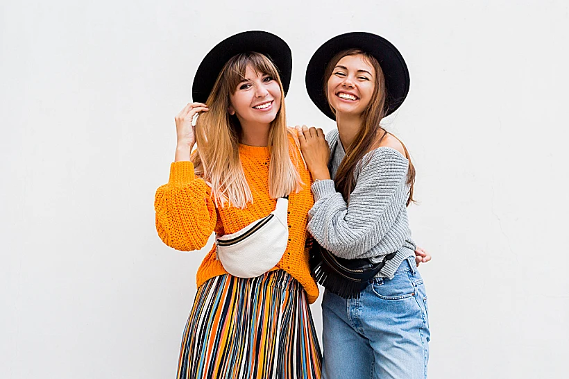 Best,friends,embracing,,,couple,of,stylish,girls,posing,on