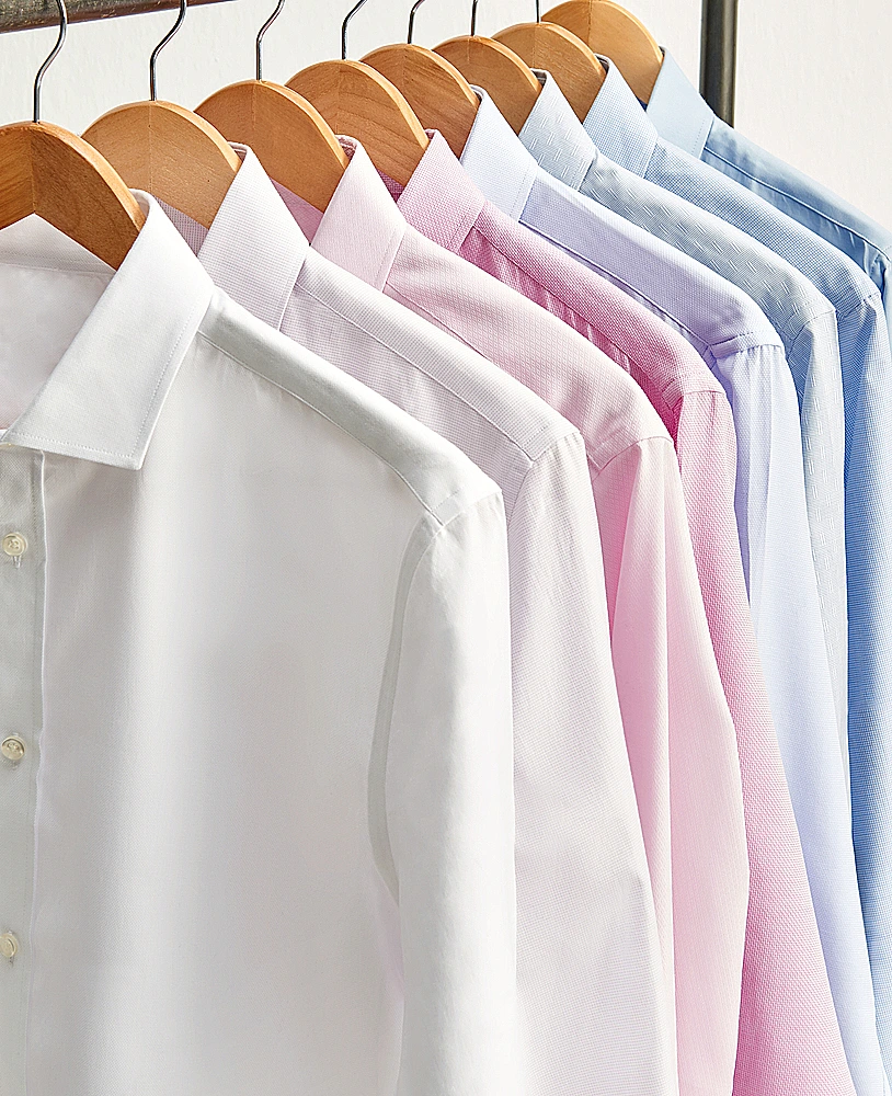 Hanging,degrade,shirts,view,with,wooden,hangs,white,pink,blue