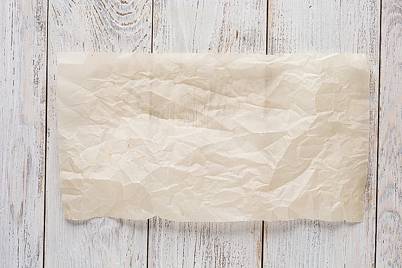 Cooking,paper,over,wooden,table,background,close,up