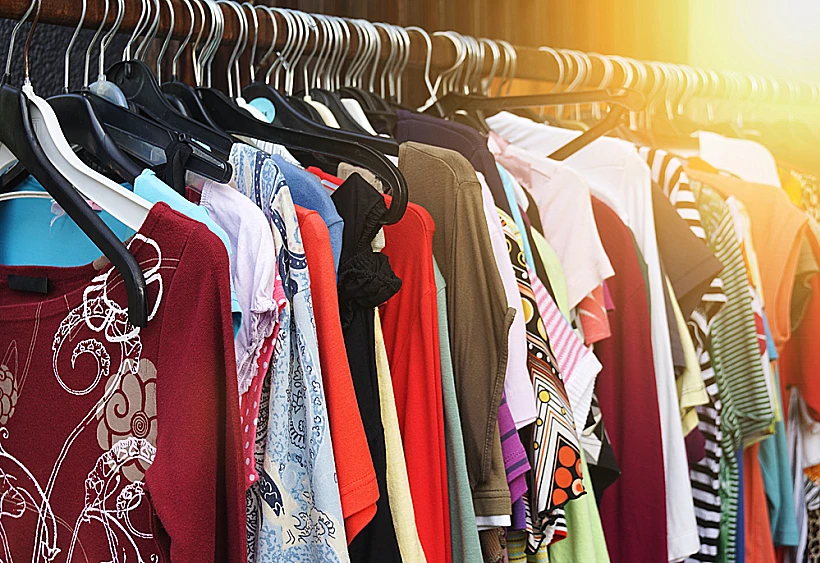 Clothes,rack,with,vintage,second,hand,women's,fashion.,filtered,image