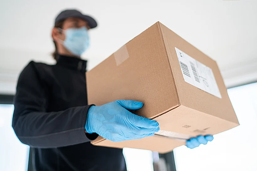 Home,delivery,shopping,box,man,wearing,gloves,and,protective,mask