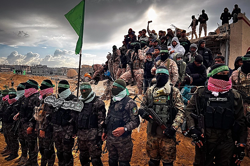 מחבלי חמאס בטקס החזרת החללים