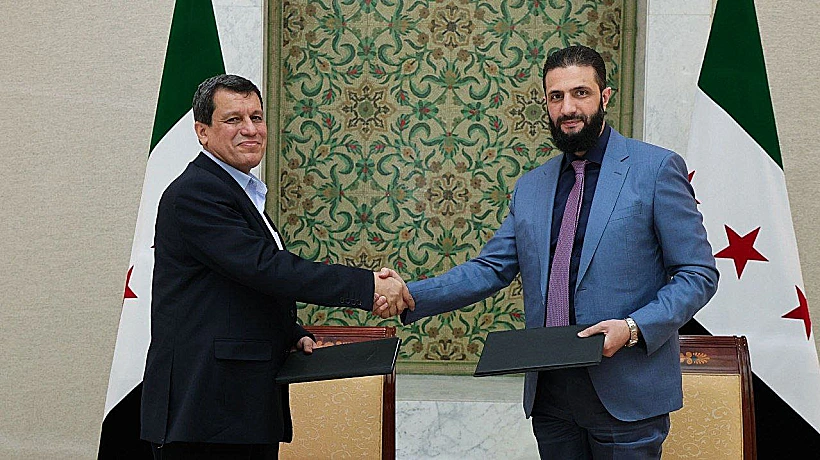 נשיא סוריה אבו מוחמד אל-ג'ולאני ומפקד הכוחות הכורדים מזלום עבאדי