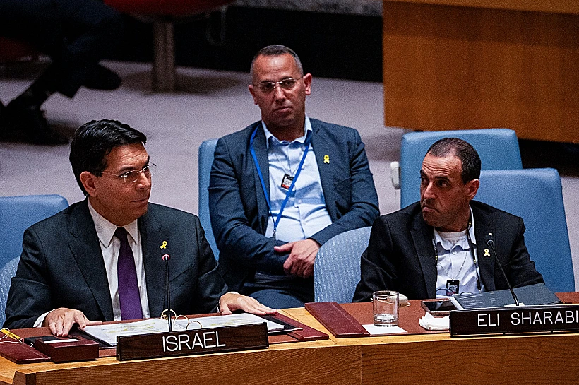 אלי שרעבי לצד אחיו שרון והשגריר דני דנון במועצת הביטחון של האו"ם
