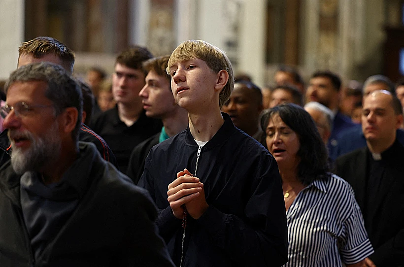 מאמין קתולי בוותיקן בזמן הקונקליווה