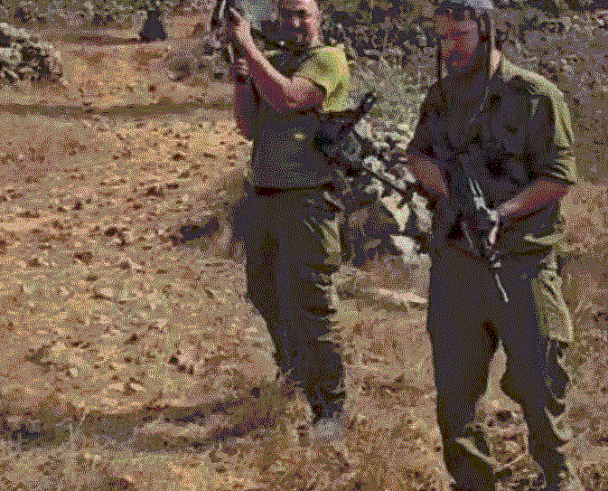 מתנחלים חמושים במדי צה"ל