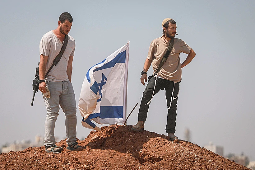 מתנחלים בכפר קוסרה הסמוך לשכם