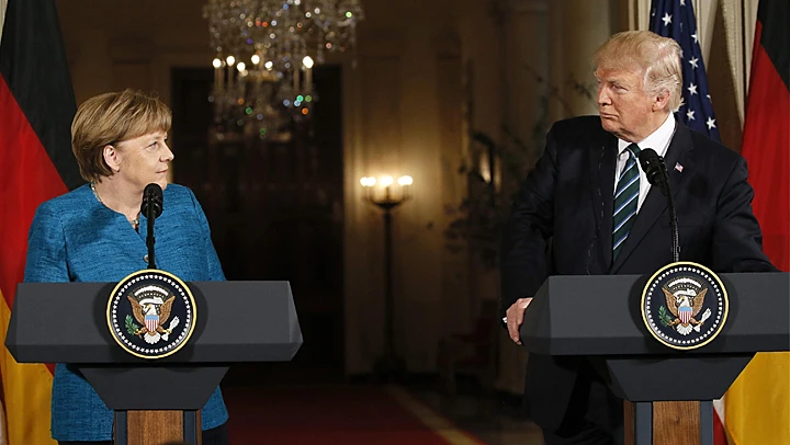 טראמפ ואנגלה מרקלר