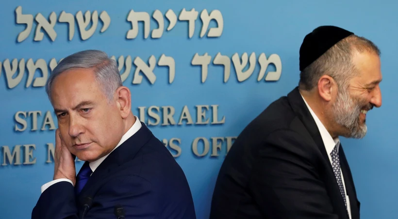 ראש הממשלה נתניהו ושר הפנים אריה דרעי במסיבת העיתונאים על הסכם הפליטים (רויטרס )