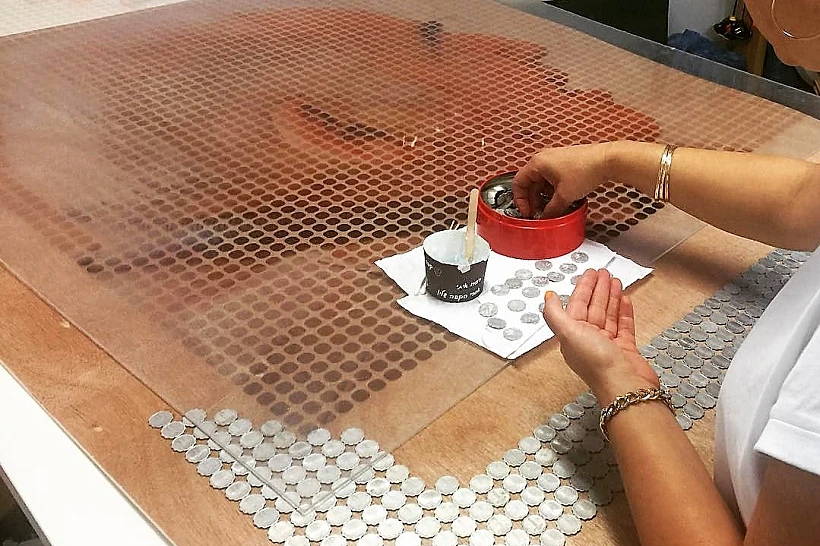 פורטרט עשי מטבעות שנמצאו בעליית הגג