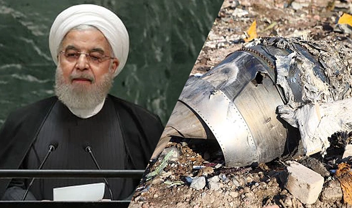 חסן רוחאני וחתיכות המטוס האוקריאני לאחר ההתרסקות
