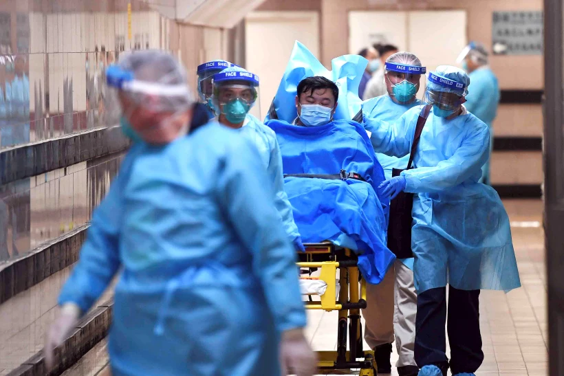 Medical Staff Transfer A Patient Of A Highly Suspected Case Of A New Coronavirus At The Queen Elizabeth Hospital In Hong Kong