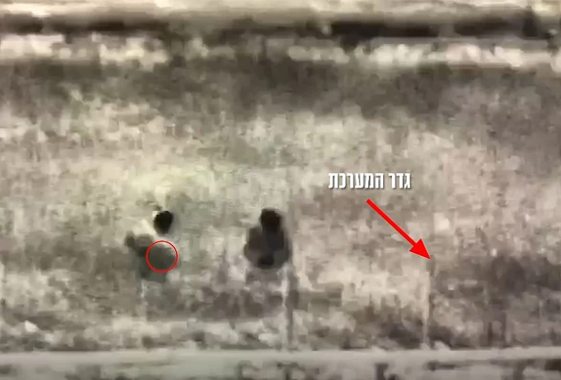 הנחת המטען על גדר המערכת על ידי חוליית טרור