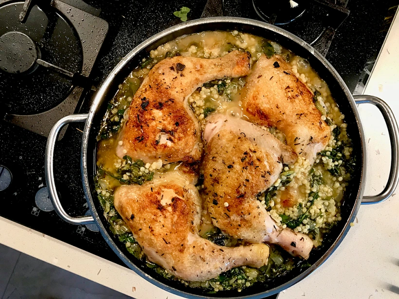 Couscous,with,chicken,legs,and,chard,roots,in,pan,ready