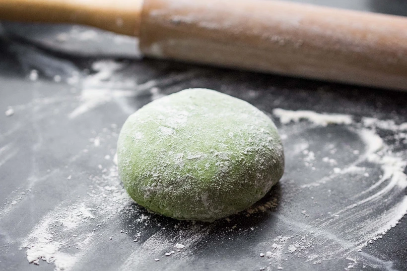 Ravioli,pasta,from,green,dough,with,mushroom,stuffing,,oil,,parsley,